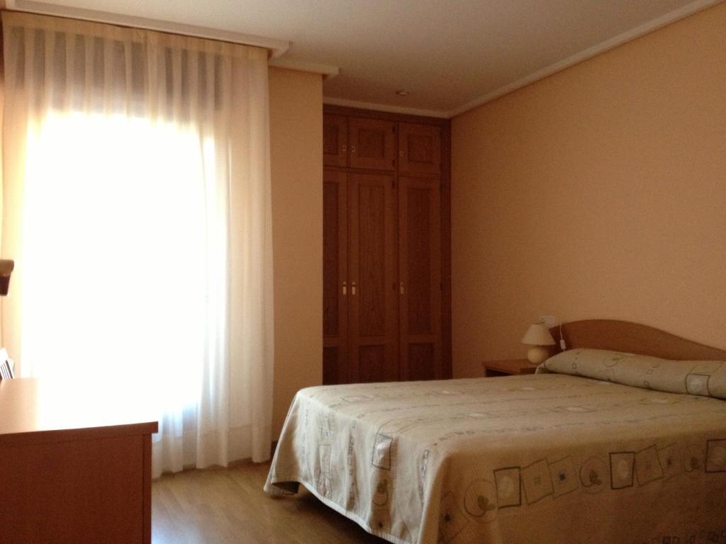 Apartamentos Turisticos Puerta de León Leão Quarto foto
