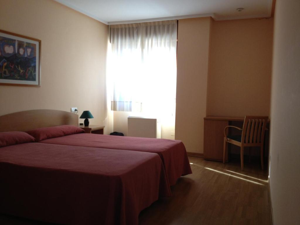 Apartamentos Turisticos Puerta de León Leão Quarto foto